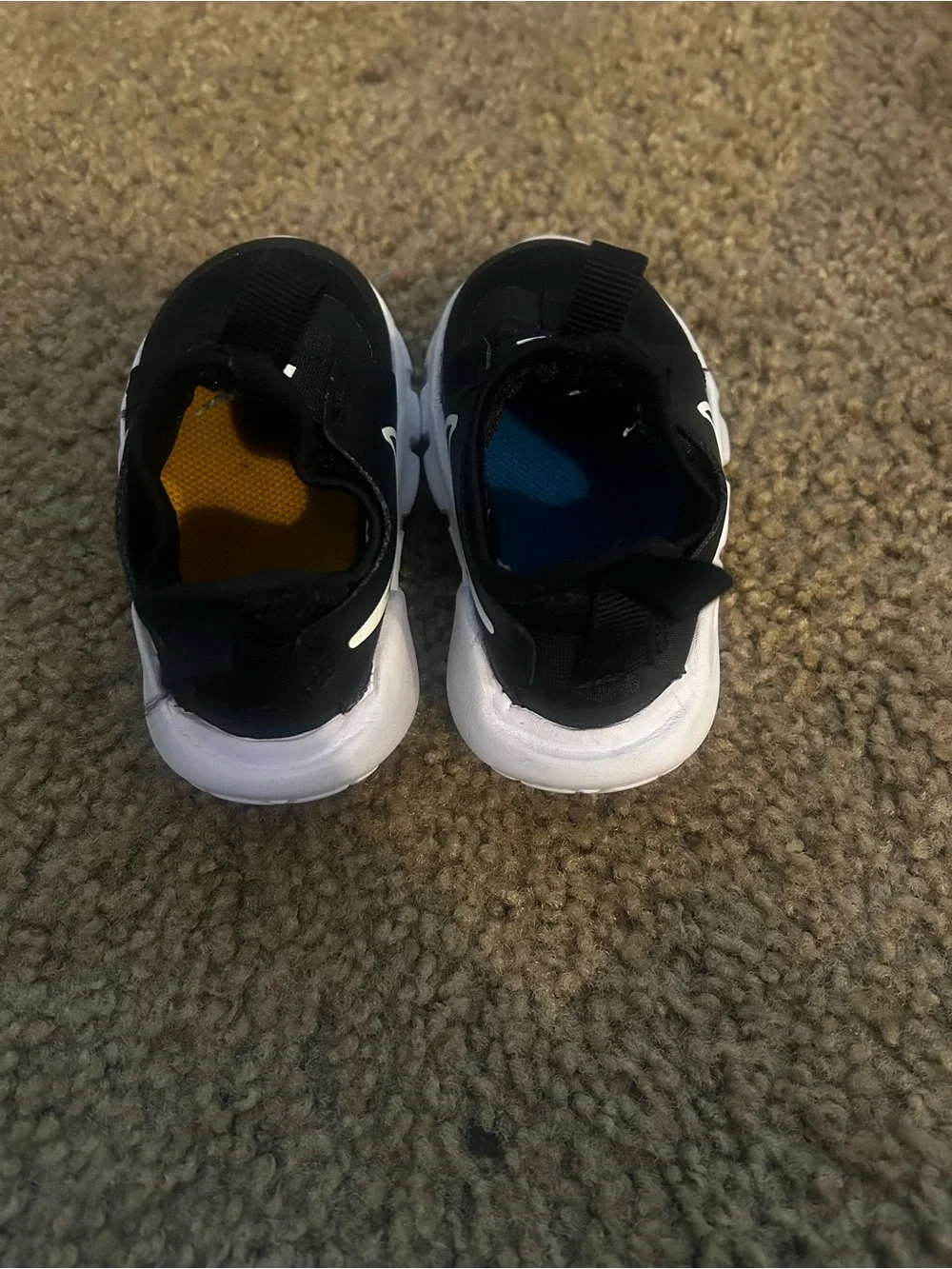 Nike Black and White Kids Slip-On Athletic Sneakers